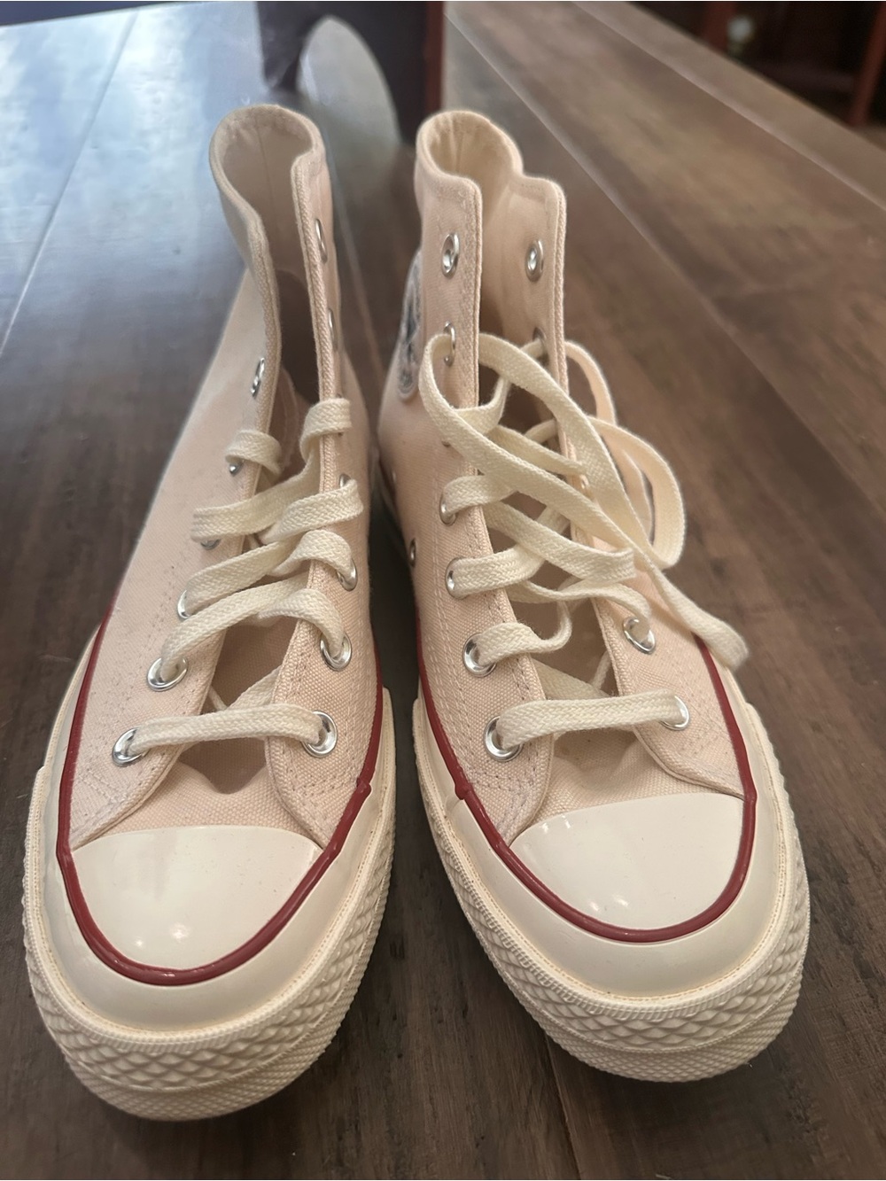 Converse High Top Sneakers in Cream with Red Trim